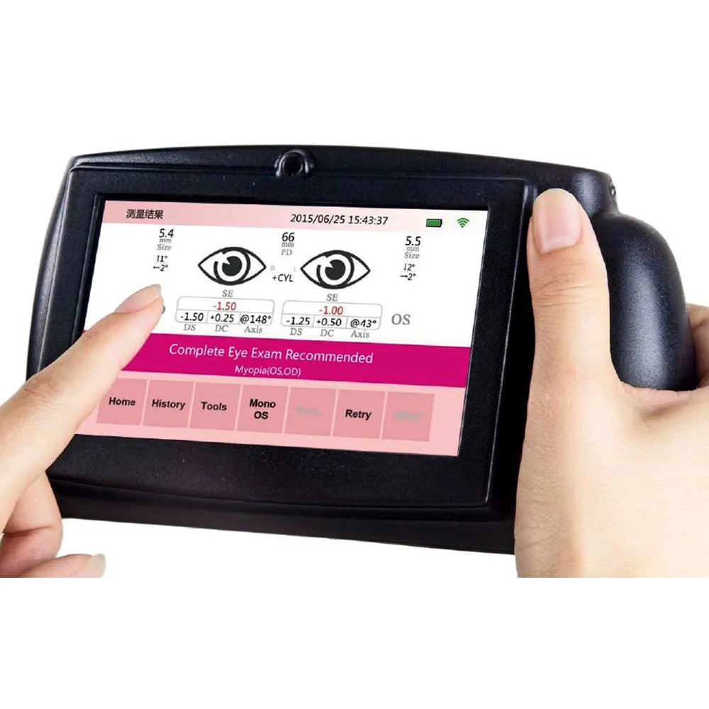 Clinician's hands holding a handheld vision screening device while a finger points to the results on its screen.