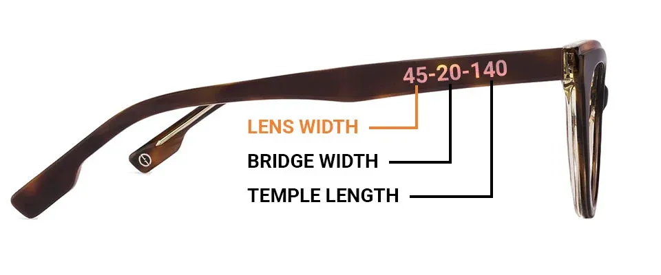 Young child wearing new eyeglasses and smiling at the camera